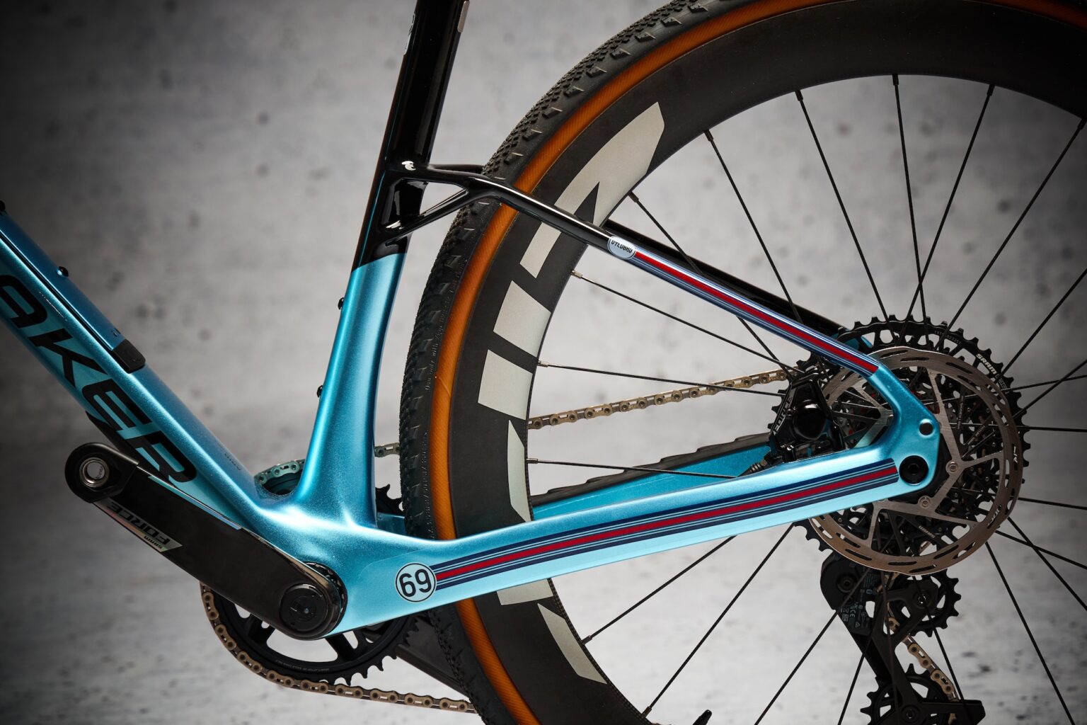 studio image of the rear triangle of a gravel bike with the DyedBro Racing kit installed