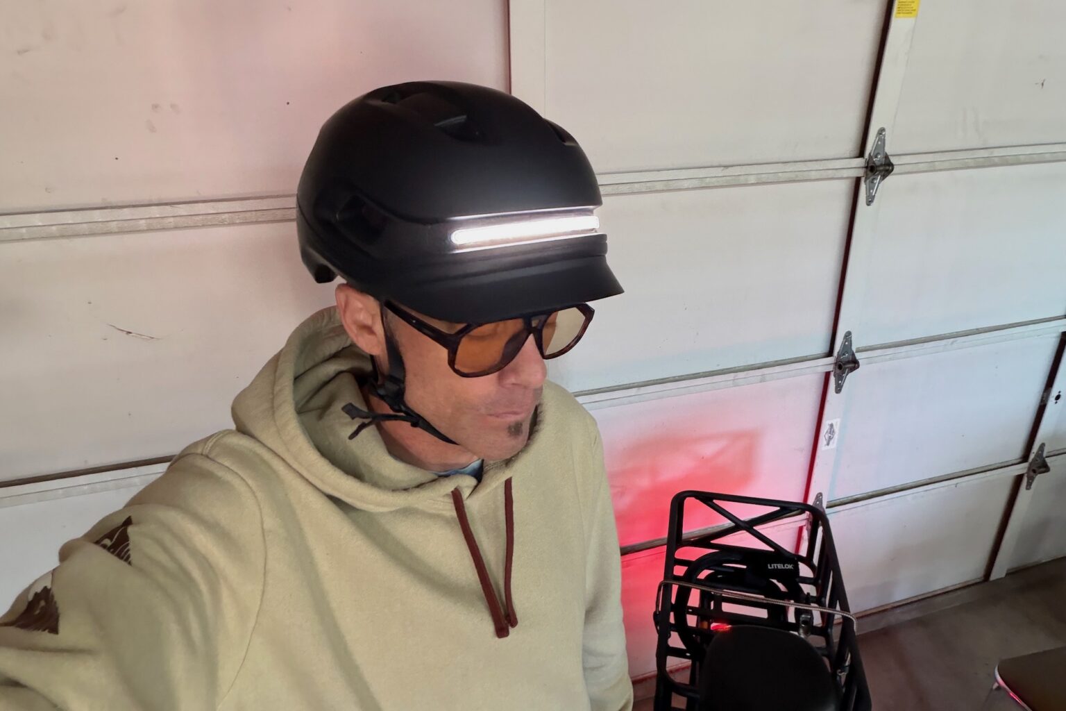 the Unit 1 Aura on my head with the front light on